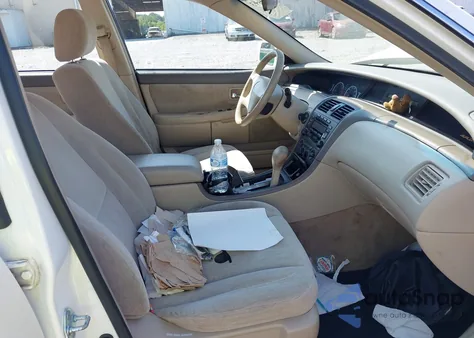 2000 Toyota Avalon Xl from USA, damaged, VIN 4T1BF28B2YU052593